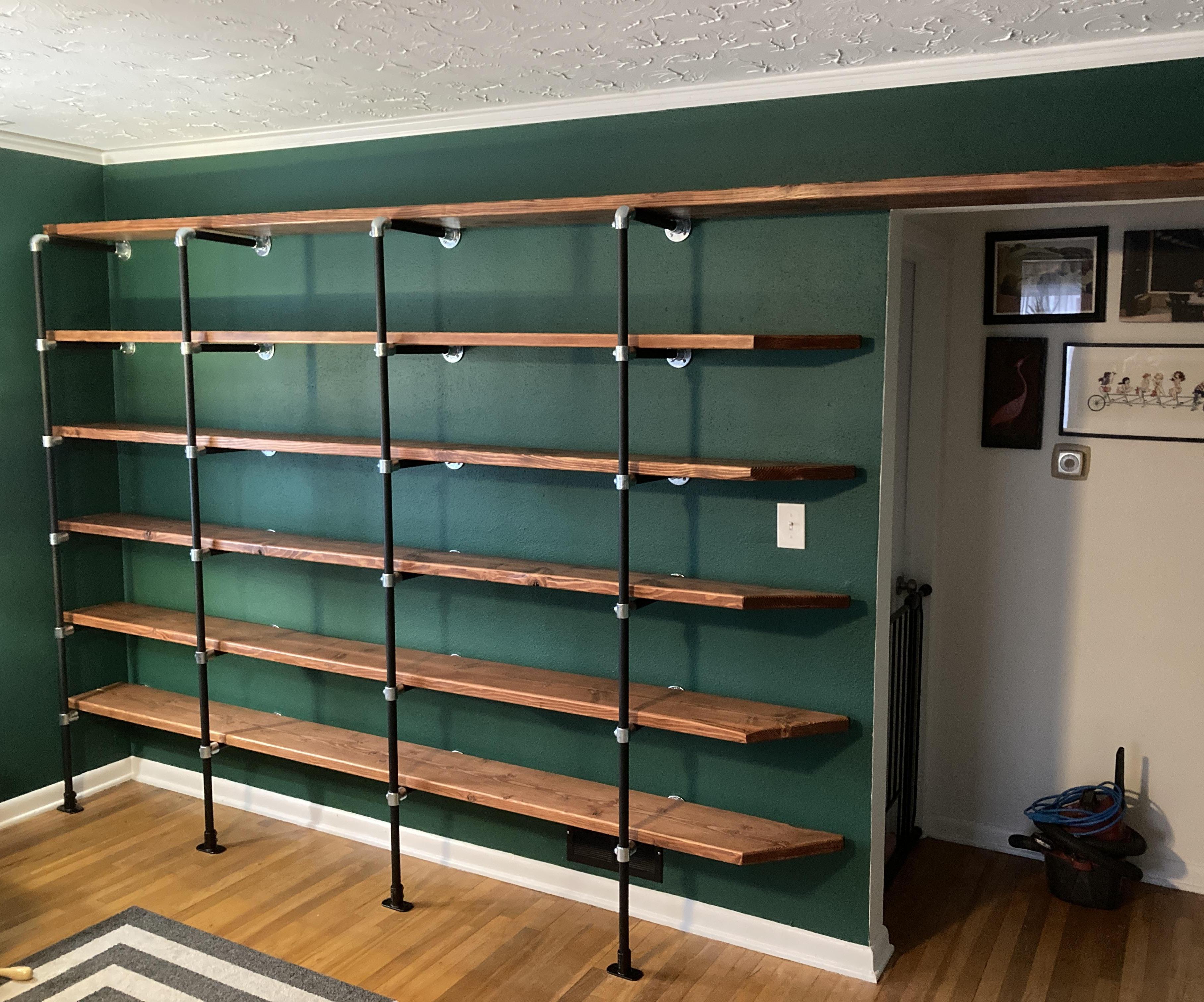 Reclaimed Wood and Structural Pipe Full Wall Bookshelves