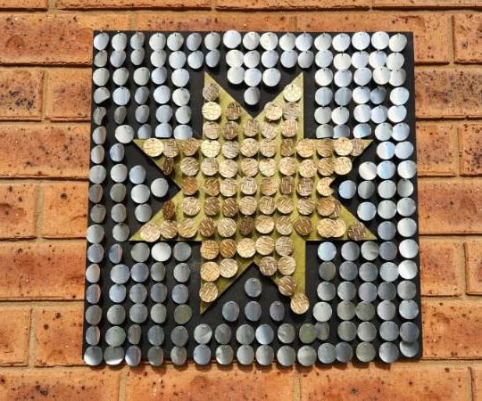 Moving Wall Art Made From Recycled Soda Cans