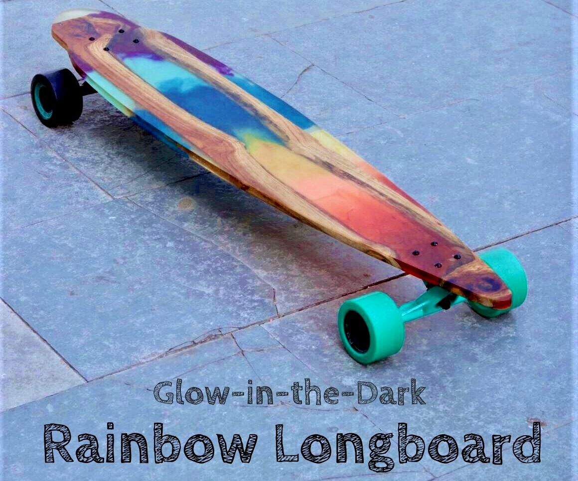 Rainbow Glow in the Dark Longboard Made With Wood and Epoxy 